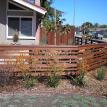 Horizontal plank redwood fence